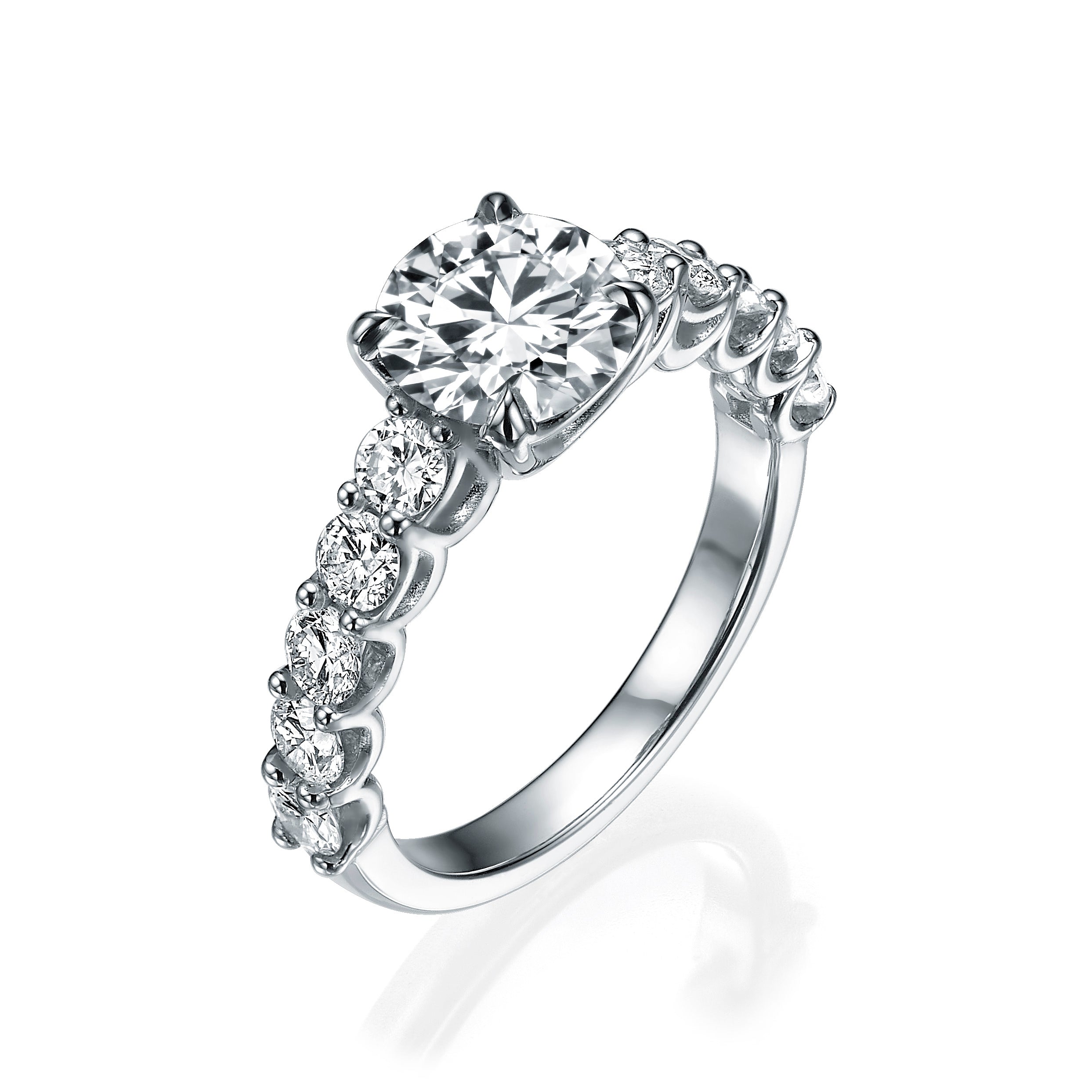 ENGAGEMENT RING 1CT +0.1CT EACH SIDE DIAMONDS