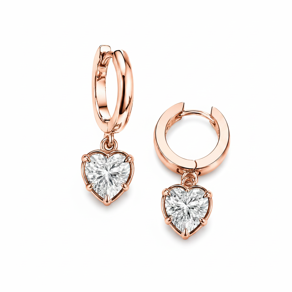 Rose gold hoop earrings with heart-shaped diamond pendants on a white background