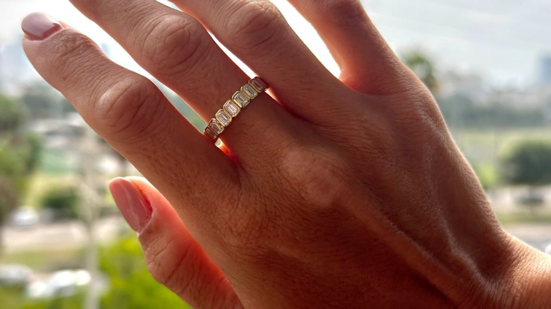BEZEL SET EMERALD CUT DIAMOND RING - on hand